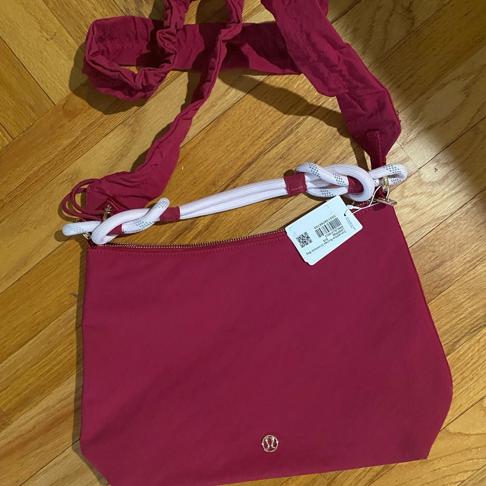 lululemon athletica Pink Crossbody Bag with White Accent Strap